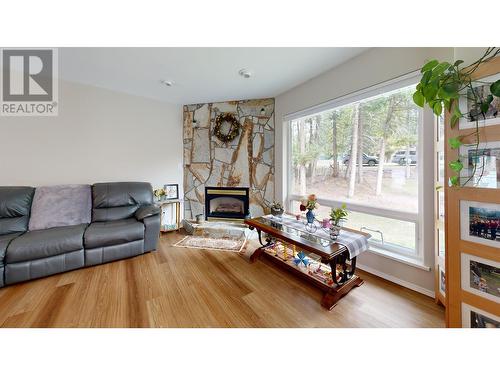 4908 Peasim Court, 108 Mile Ranch, BC - Indoor Photo Showing Living Room With Fireplace