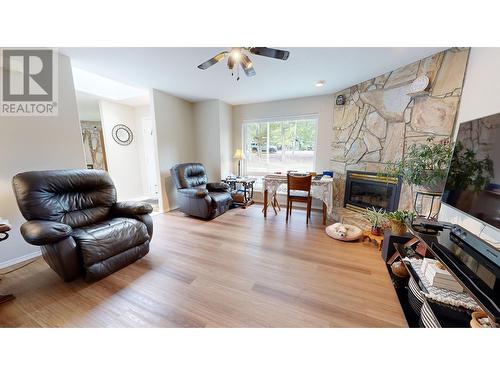 4908 Peasim Court, 108 Mile Ranch, BC - Indoor Photo Showing Living Room With Fireplace