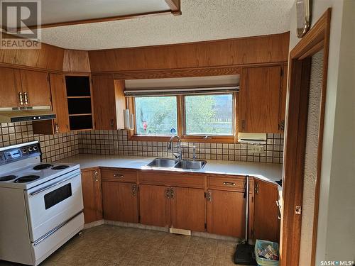 203 Main Street, Lipton, SK - Indoor Photo Showing Kitchen With Double Sink