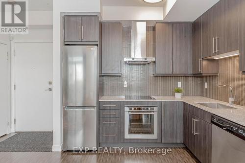 709 - 2093 Fairview Street, Burlington, ON - Indoor Photo Showing Kitchen With Upgraded Kitchen