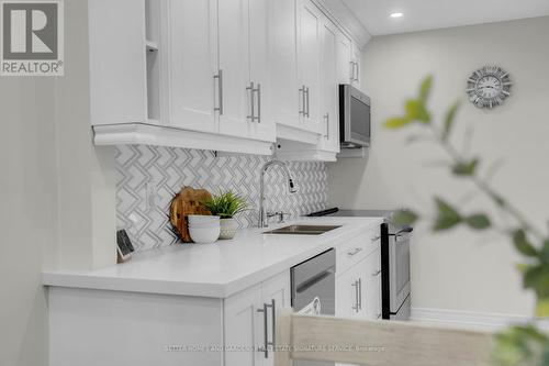 42 Ellis Drive, Brampton (Southgate), ON - Indoor Photo Showing Kitchen With Double Sink