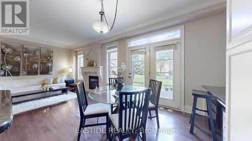 42 - 4123 Shipp Drive, Mississauga, ON - Indoor Photo Showing Dining Room With Fireplace