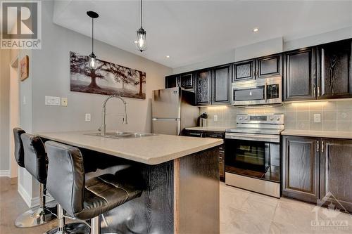 1113K Stittsville Main Street, Stittsville, ON - Indoor Photo Showing Kitchen With Stainless Steel Kitchen With Double Sink