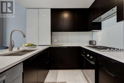 2203, 1111 10 Street Sw, Calgary, AB - Indoor Photo Showing Kitchen With Double Sink