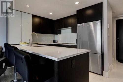 2203, 1111 10 Street Sw, Calgary, AB - Indoor Photo Showing Kitchen With Stainless Steel Kitchen With Upgraded Kitchen