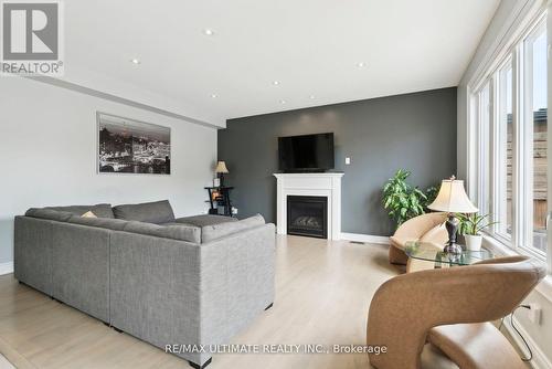 204 Strachan Trail, New Tecumseth, ON - Indoor Photo Showing Living Room With Fireplace