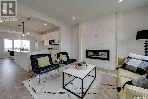 5516 Nicholson Avenue, Regina, SK - Indoor Photo Showing Living Room With Fireplace