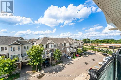 411 - 1005 Nadalin Heights, Milton, ON - Outdoor With Balcony