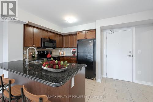 411 - 1005 Nadalin Heights, Milton, ON - Indoor Photo Showing Kitchen With Double Sink