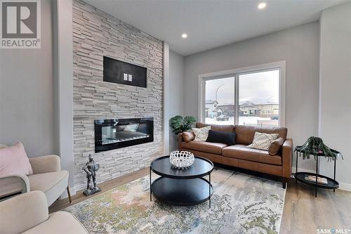 5513 Nicholson Avenue, Regina, SK - Indoor Photo Showing Living Room With Fireplace