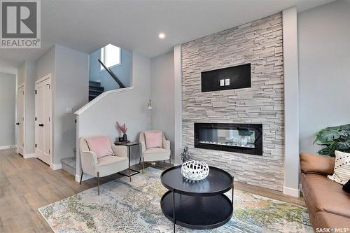 5513 Nicholson Avenue, Regina, SK - Indoor Photo Showing Living Room With Fireplace