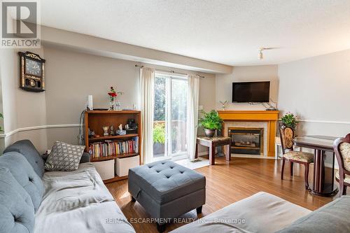 16 Newell Court, Hamilton (Waterdown), ON - Indoor Photo Showing Living Room With Fireplace