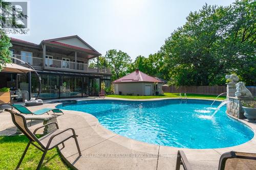 6949 Thorold Stone Road, Niagara Falls, ON - Outdoor With In Ground Pool With Backyard