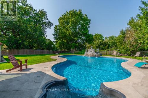 6949 Thorold Stone Road, Niagara Falls (Stamford), ON - Outdoor With In Ground Pool With Backyard