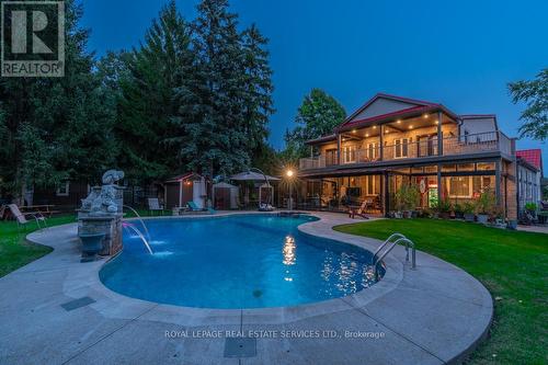 6949 Thorold Stone Road, Niagara Falls, ON - Outdoor With In Ground Pool With Backyard