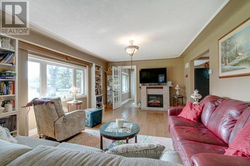 6949 Thorold Stone Road, Niagara Falls, ON - Indoor Photo Showing Living Room With Fireplace