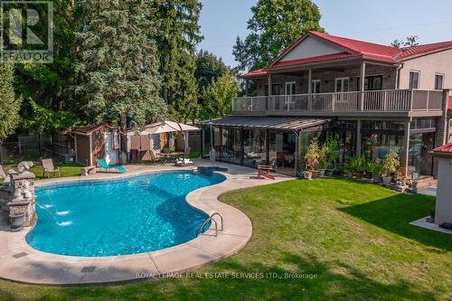 6949 Thorold Stone Road, Niagara Falls, ON - Outdoor With In Ground Pool With Deck Patio Veranda With Backyard