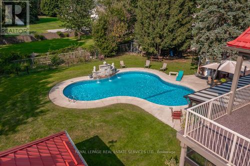 6949 Thorold Stone Road, Niagara Falls, ON - Outdoor With In Ground Pool With Backyard