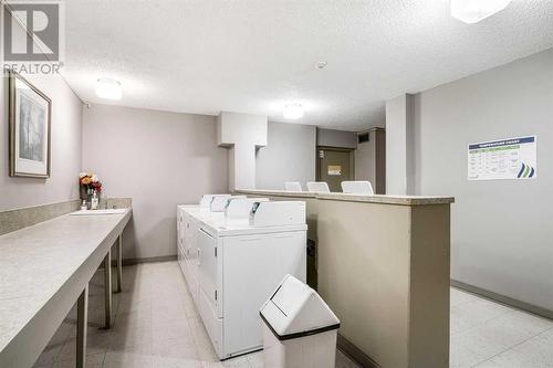 236, 820 89 Avenue Sw, Calgary, AB - Indoor Photo Showing Laundry Room