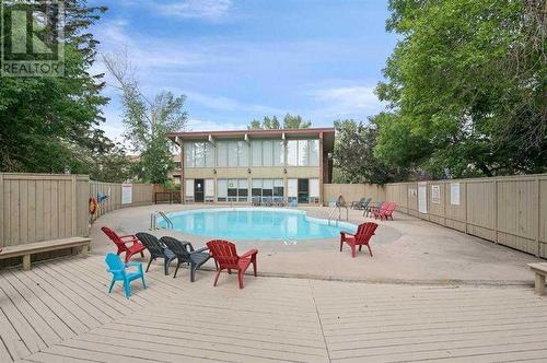 236, 820 89 Avenue Sw, Calgary, AB - Outdoor With In Ground Pool With Exterior