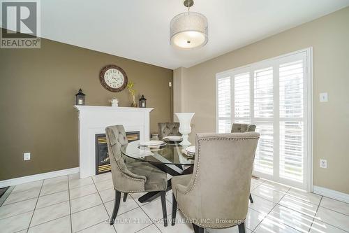 87 Glacier Crescent, Toronto, ON - Indoor Photo Showing Dining Room With Fireplace