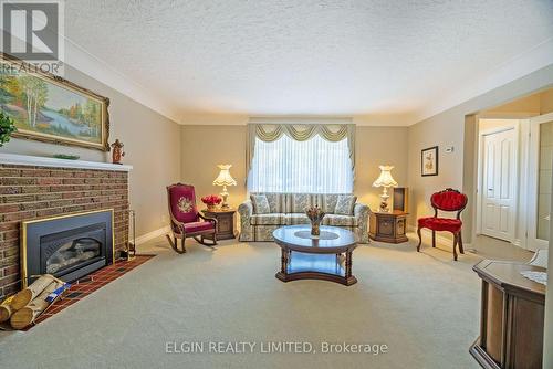 22 Fairview Avenue, St. Thomas, ON - Indoor Photo Showing Living Room With Fireplace