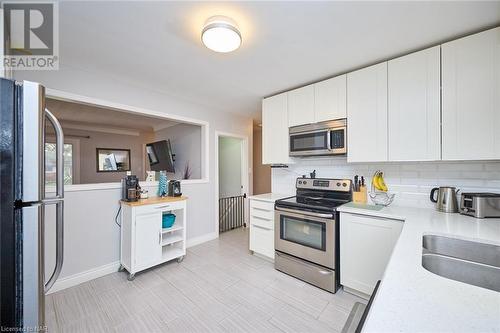 5985 Scott Street, Niagara Falls, ON - Indoor Photo Showing Kitchen With Stainless Steel Kitchen With Double Sink