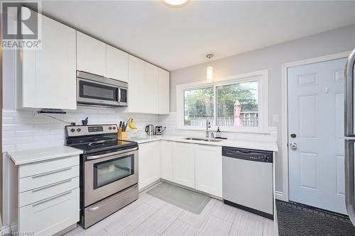 5985 Scott Street, Niagara Falls, ON - Indoor Photo Showing Kitchen With Stainless Steel Kitchen With Double Sink