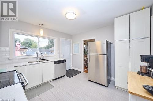 5985 Scott Street, Niagara Falls, ON - Indoor Photo Showing Kitchen With Stainless Steel Kitchen With Double Sink