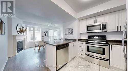 Th#914 - 16 Laidlaw Street, Toronto (South Parkdale), ON - Indoor Photo Showing Kitchen With Fireplace