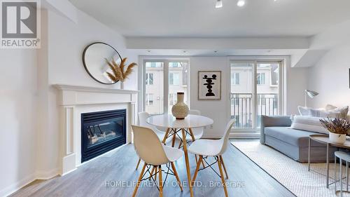 Th#914 - 16 Laidlaw Street, Toronto (South Parkdale), ON - Indoor Photo Showing Living Room With Fireplace