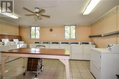 communal room - 1968 Main Street W Unit# 401, Hamilton, ON - Indoor Photo Showing Laundry Room