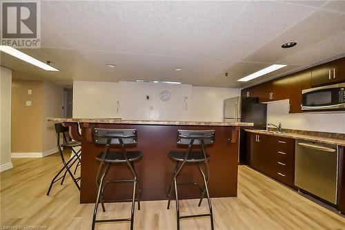 communal room - 1968 Main Street W Unit# 401, Hamilton, ON - Indoor Photo Showing Kitchen