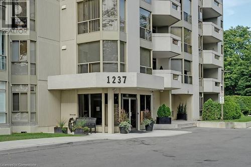 1237 North Shore Boulevard E Unit# 407, Burlington, ON - Outdoor With Balcony With Facade