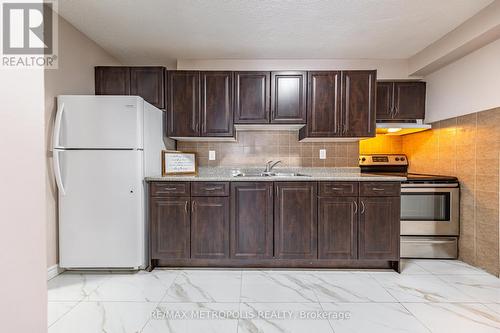 1105 - 15 Torrance Road, Toronto, ON - Indoor Photo Showing Kitchen With Double Sink