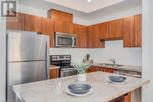 67 Frasson Drive, Guelph, ON - Indoor Photo Showing Kitchen With Stainless Steel Kitchen With Double Sink