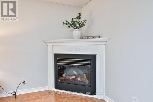 205 Ellis Crescent, Milton (Dempsey), ON - Indoor Photo Showing Living Room With Fireplace