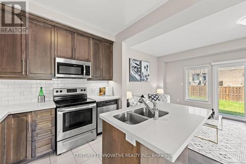 157 Fall Fair Way, Hamilton (Binbrook), ON - Indoor Photo Showing Kitchen With Double Sink With Upgraded Kitchen