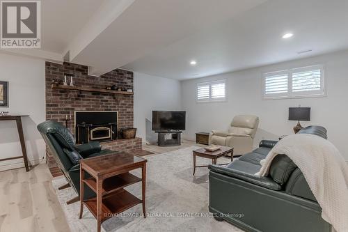 18 Ilona Court, Brant, ON - Indoor With Fireplace