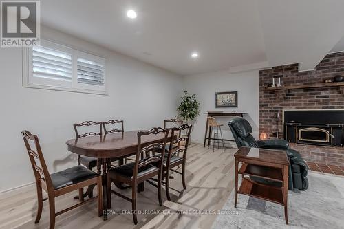 18 Ilona Court, Brant, ON - Indoor Photo Showing Dining Room With Fireplace