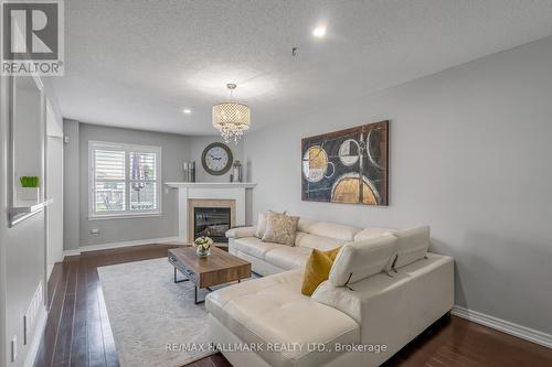 260 Fall Fair Way, Hamilton (Binbrook), ON - Indoor Photo Showing Living Room With Fireplace