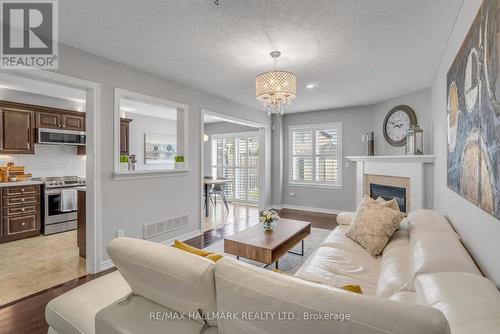 260 Fall Fair Way, Hamilton (Binbrook), ON - Indoor Photo Showing Living Room With Fireplace