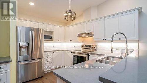 74 - 1241 Beaverbrook Avenue, London, ON - Indoor Photo Showing Kitchen With Stainless Steel Kitchen With Double Sink With Upgraded Kitchen