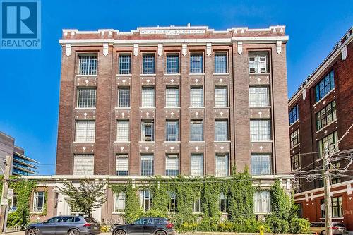 400 - 245 Carlaw Avenue, Toronto (South Riverdale), ON - Outdoor With Facade