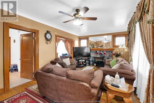 1407 Hall, Windsor, ON - Indoor Photo Showing Living Room With Fireplace