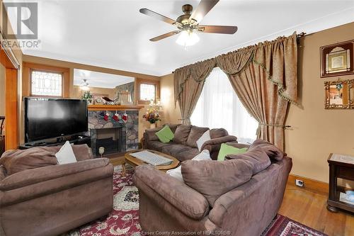 1407 Hall, Windsor, ON - Indoor Photo Showing Living Room With Fireplace