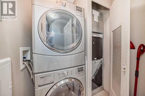 W/D and control of your own heat and air conditioning - 306, 1320 1 Street Se, Calgary, AB - Indoor Photo Showing Laundry Room