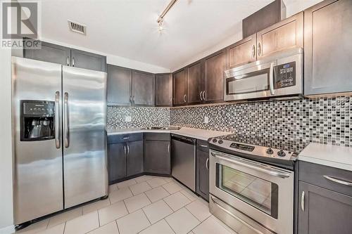 306, 1320 1 Street Se, Calgary, AB - Indoor Photo Showing Kitchen With Upgraded Kitchen