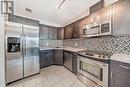 306, 1320 1 Street Se, Calgary, AB  - Indoor Photo Showing Kitchen With Upgraded Kitchen 