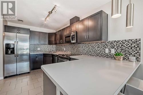 306, 1320 1 Street Se, Calgary, AB - Indoor Photo Showing Kitchen With Upgraded Kitchen